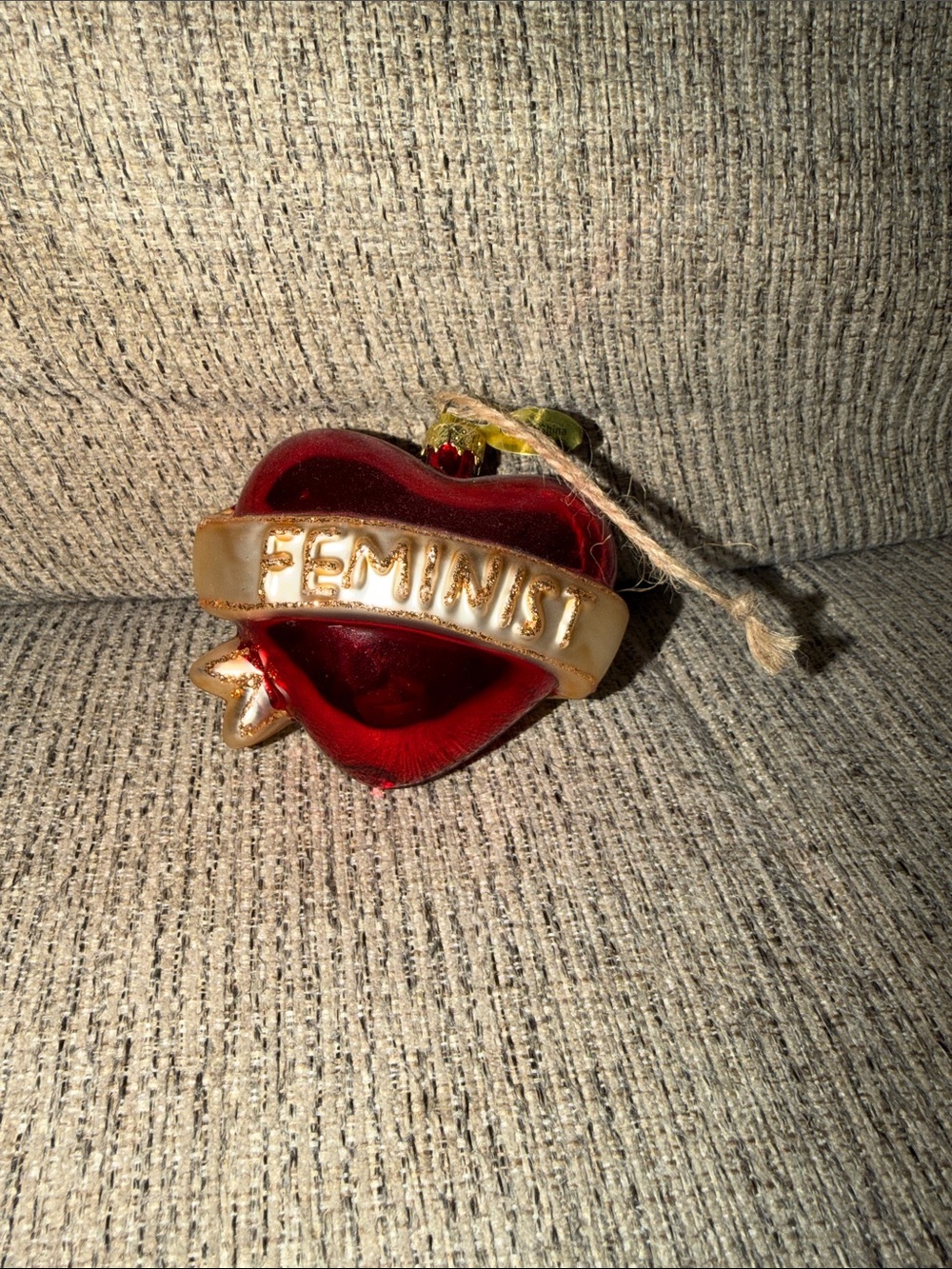 Gorgeous glass Red Heart Ornament with 'FEMINIST' Banner bought from DOLLSKILL